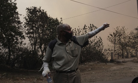 Algerian man fleeing fire
