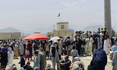 Afghans standing outside airport