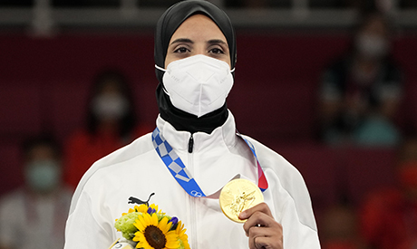 Gold medalist Feryal Abdelaziz of Egypt poses during the medal ceremony for women