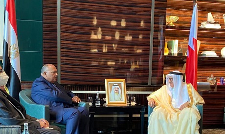 Egypt’s Foreign Minister Sameh Shoukry and Bahraini counterpart Abdullatif Al-Zayani during a meetin