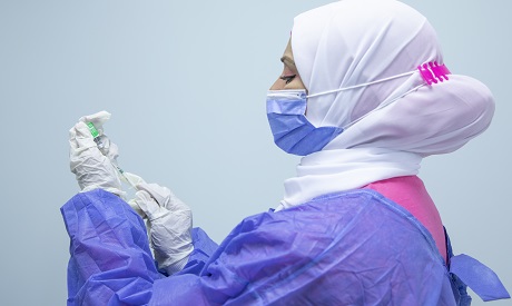 File photo: A nurse prepares the AstraZeneca coronavirus vaccine at Al-Nozha Hospital in Cairo
