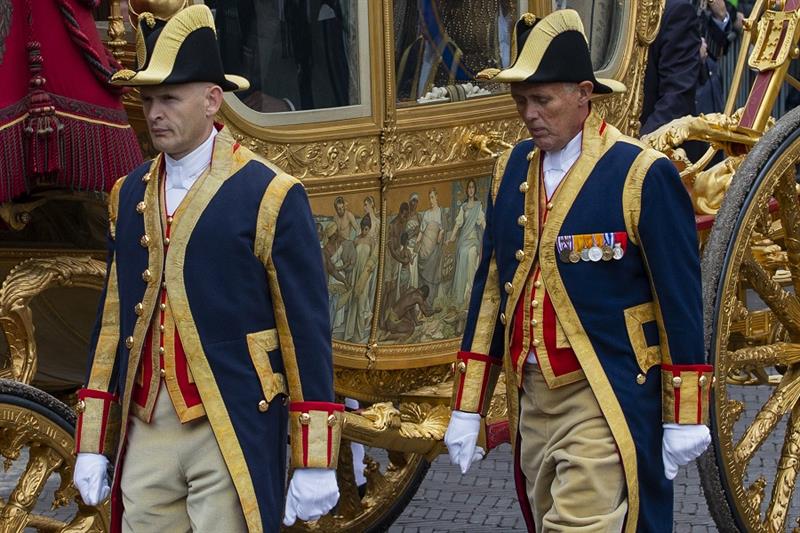 Footmen walk alongside the Royal Golden Carriage, Netherlands 