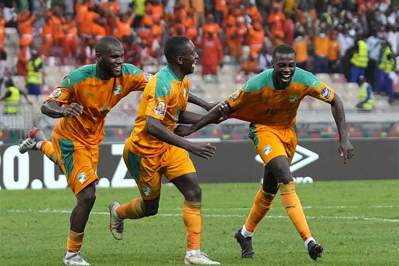 Ivory Coast s Nicolas Pepe, right, celebrates with teammates after scoring during the African Cup of
