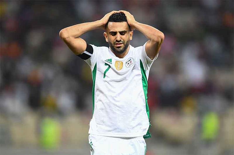 Algeria s forward Riyad Mahrez reacts after Algeria missed a free kick during the Group E Africa Cup