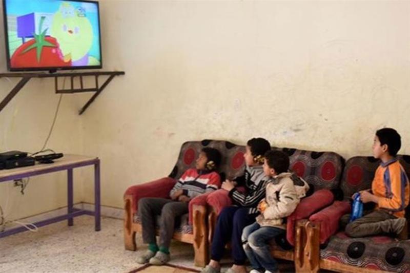 Children watching TV