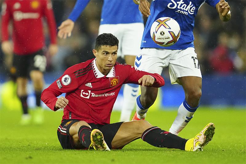Manchester United s Cristiano Ronaldo falls to the ground during the Premier League soccer match bet