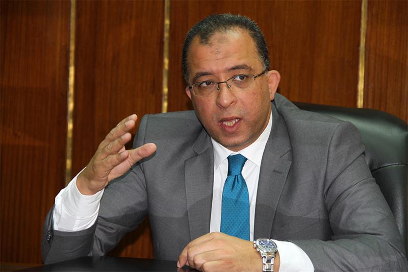  former Minister of Planning and International Cooperation Ashraf El-Araby.
