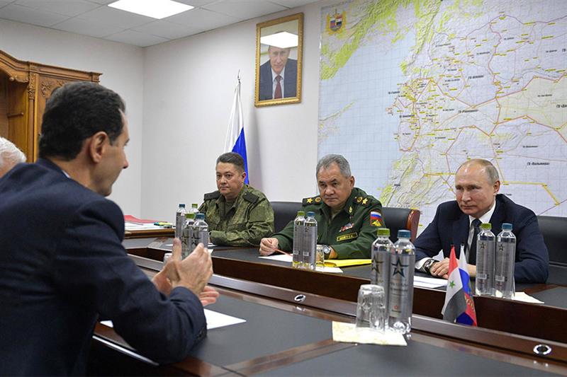 From right, President Vladimir Putin, Defense Minister Sergei Shoigu and Lt. Gen. Alexander Chaiko l