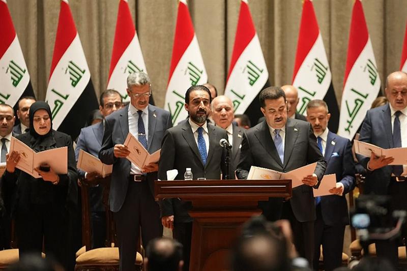Ministers of the new Iraqi government being sworn in during the parliamentary session to vote on the