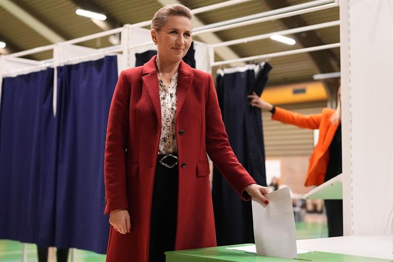 Danish Prime Minister Mette Frederiksen casts her ballot at a polling station in Hareskovhallen in V