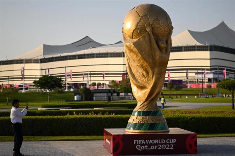 A giant replica of the World Cup trophy stands in front of the Al-Bayt Stadium where the tournament 