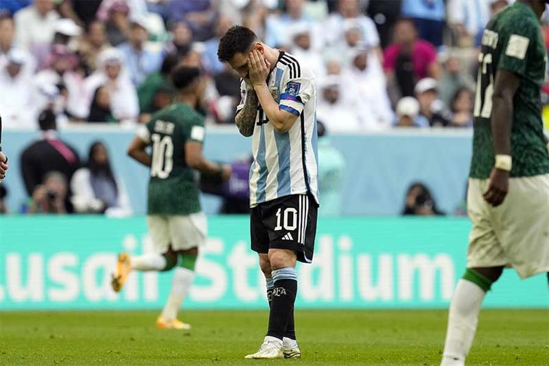 Argentina s Lionel Messi reacts disappointed during the World Cup group C soccer match between Argen