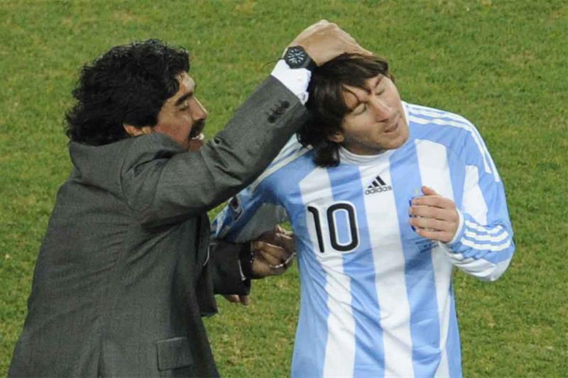 file photo taken on June 27, 2010 Argentina s striker Lionel Messi (R) is congratulated by Argentina