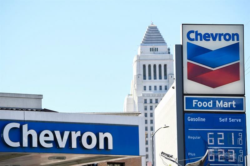 Los Angeles City Hall stands on the horizon as gasoline fuel prices above six dollars a gallon are d