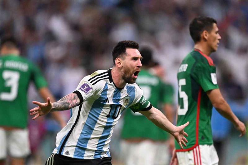 Argentina s forward #10 Lionel Messi celebrates scoring the opening goal during the Qatar 2022 World