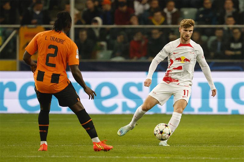 Leipzig s Timo Werner, right, controls the ball during the Champions League group F soccer match bet