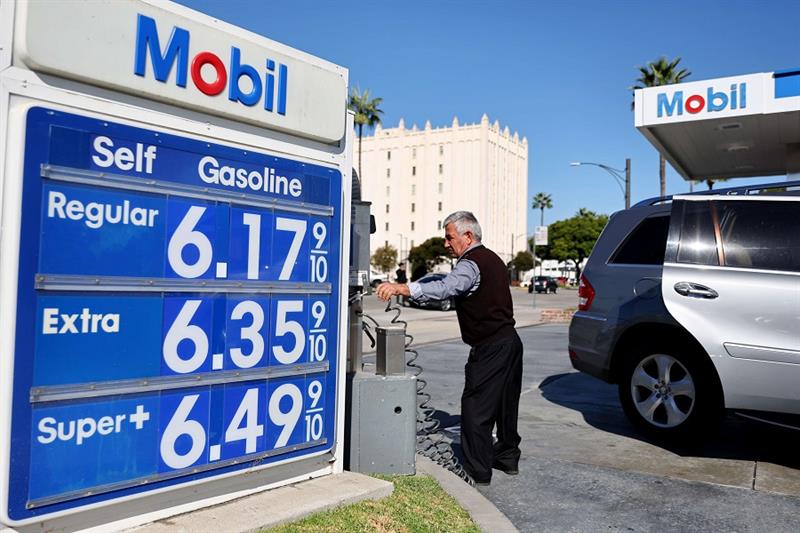 The Mobil logo and gas prices are displayed at a Mobil gas station in Los Angeles, California