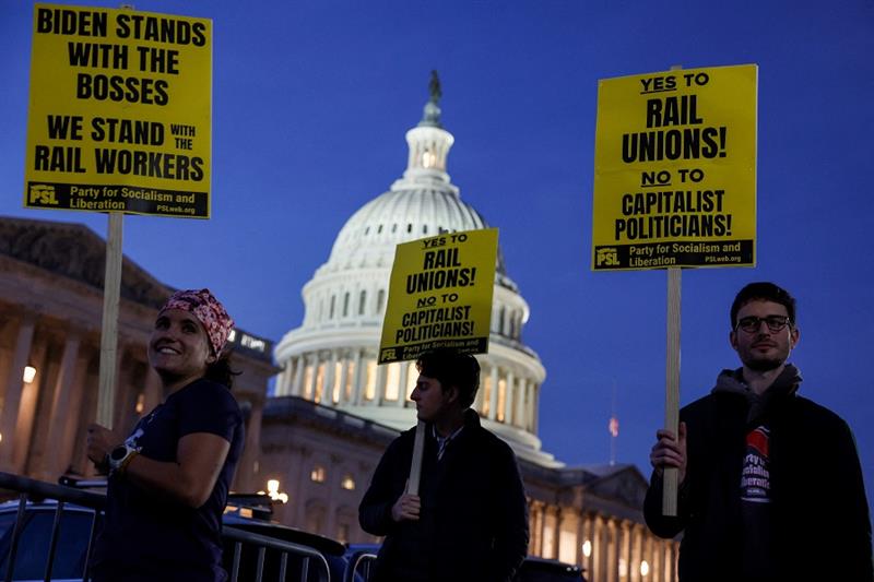 Activists in support of unionized rail workers protest outside the U.S. Capitol Building on November