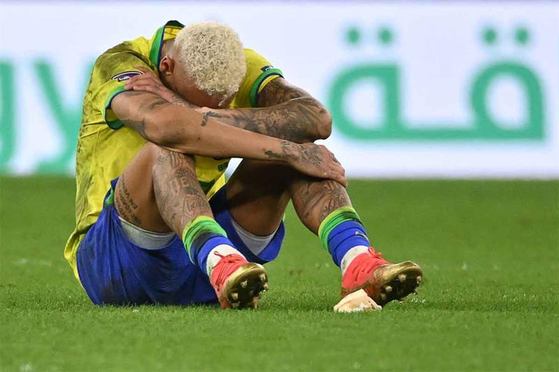 Brazil s forward #10 Neymar reacts after his team lost the Qatar 2022 World Cup quarter-final footba