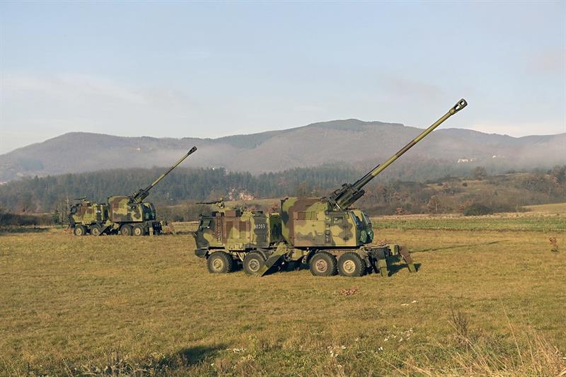 Serbian army self-propelled 155 mm gun-howitzers are seen on position near administrative line with 