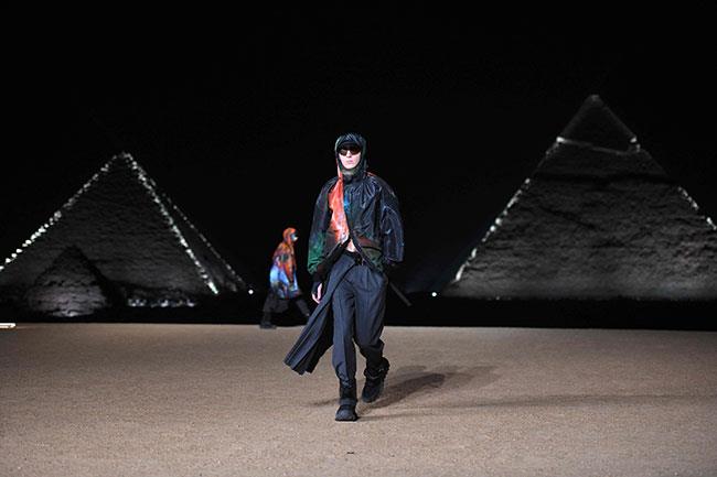A model presents a creation at the Christian Dior fashion show at the Giza Pyramids Necropolis on th