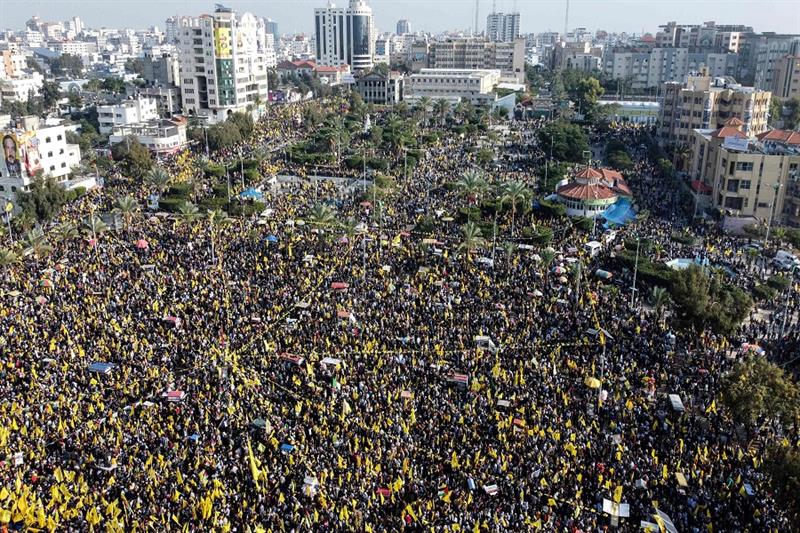An aerial picture shows Palestinians attending a rally marking the 58th anniversary of the Fatah mov