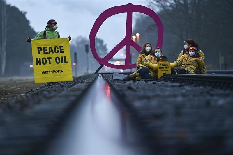 Activists from Greenpeace block