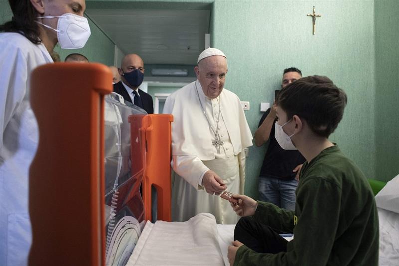 Pope Francis meeting with a boy during a visit to the Bambino Gesu Children s Hospital in Rome
