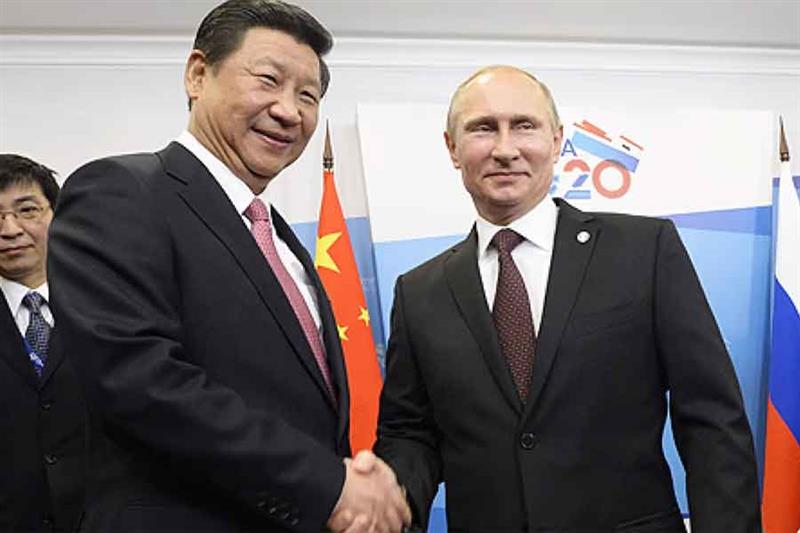President Xi Jinping meets Russia s President Vladimir Putin before the G20 summit on Thursday in Sa
