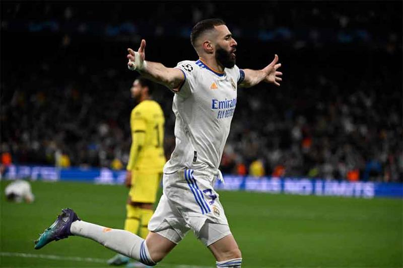 Real Madrid s French forward Karim Benzema celebrates after scoring a goal during the UEFA Champions