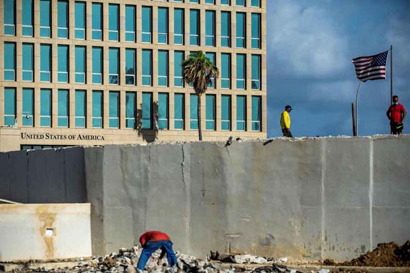 Construction workers work near the US embassy in Havana, on April 21, 2022.  AFP