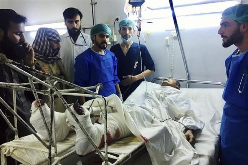 A wounded man after bombing in Afghanistan