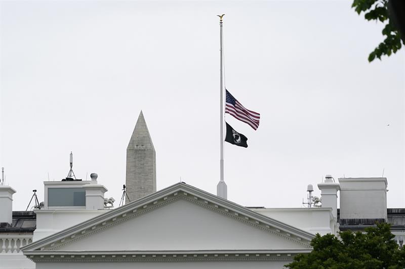 The American flag flies at half-staff at the White House
