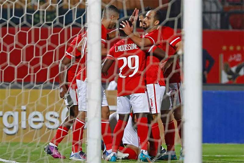 Ahly s players celebrate at the end of the CAF Champions League semi-final match between Egypt s al-