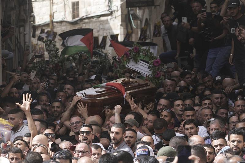 Israel police to investigate conduct at journalist funeral - Region ...