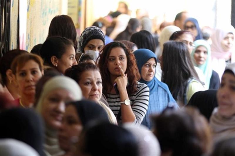 File Photo: Egyptian women queue at a polling station in the capital Cairo on Nov. 22, 2015, on the 