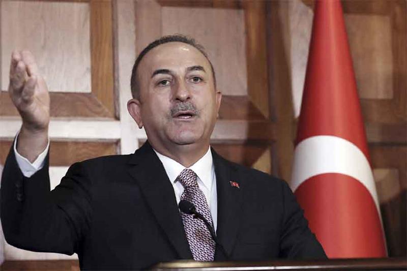 Turkey s Foreign Minister Mevlut Cavusoglu speaks to the media, in Ankara, Turkey. (AP )