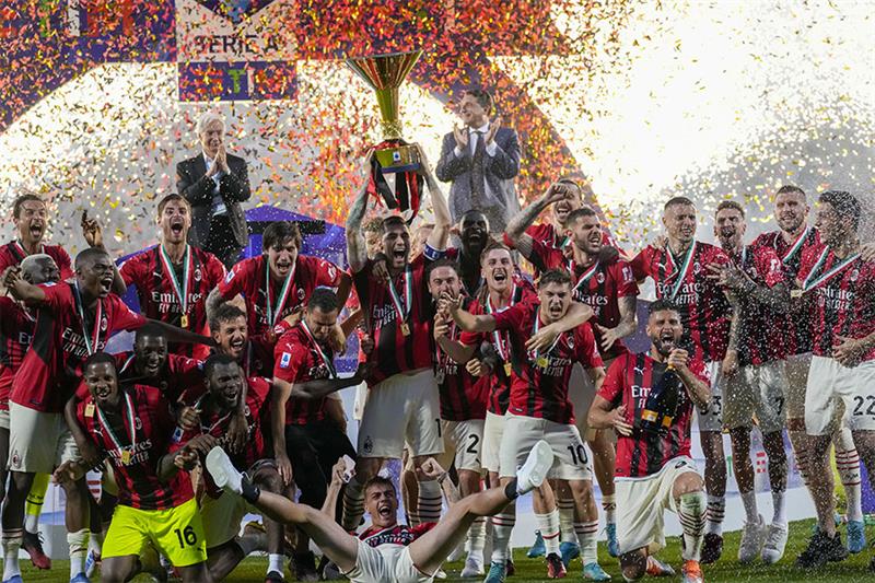 AC Milan celebrate with the Serie A trophy. AP