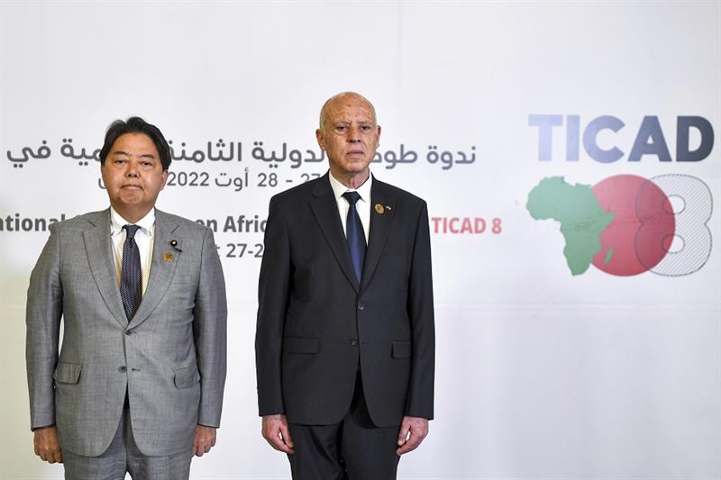 Tunisia s President Kais Saied, right, and Japan s Foreign Minister Yoshimasa Hayashi