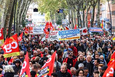 Macron agrees pension reform timeline as protests start