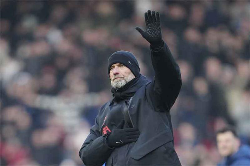 Liverpool s manager Jurgen Klopp waves after the English Premier League soccer match between Liverpo