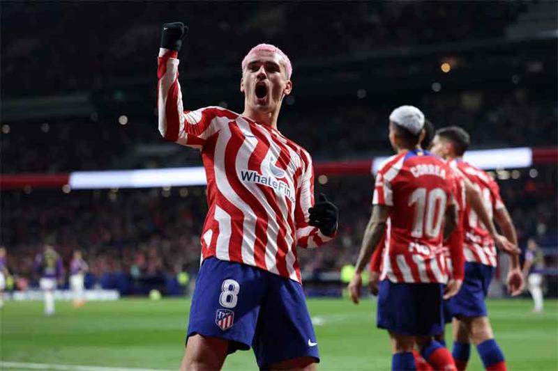 Atletico Madrid s French forward Antoine Griezmann celebrates scoring his team s second goal during 