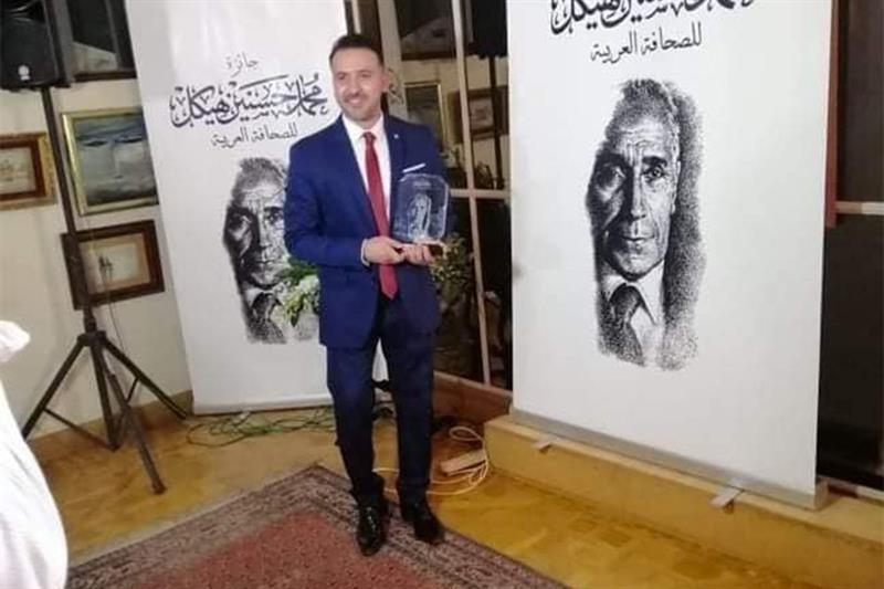 Al-Ahram journalist Ahmed Saeed wins Heikal Foundation of Arab Journalism award in 2020. File photo