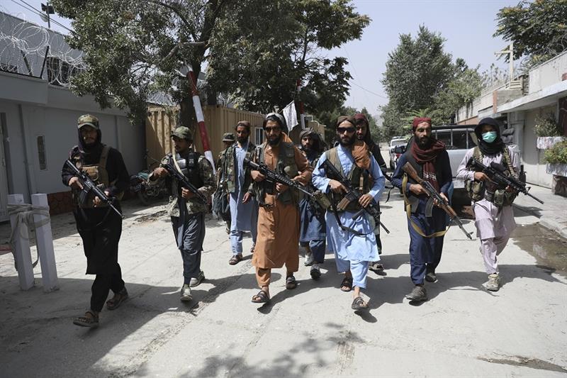 Taliban fighters patrol in the Wazir Akbar Khan neighborhood in the city of Kabul