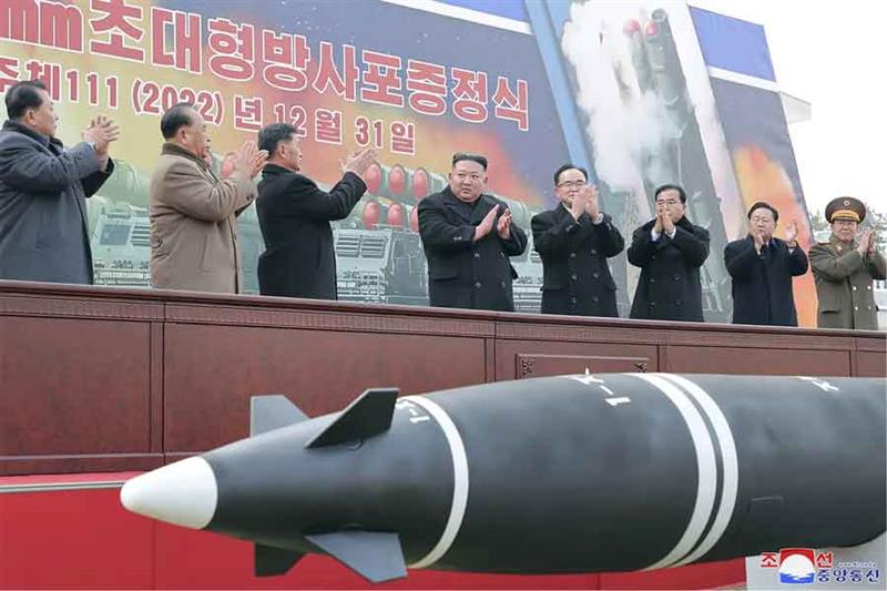 North Korean leader Kim Jong Un attends a ceremony of donating 600mm super-large multiple launch roc