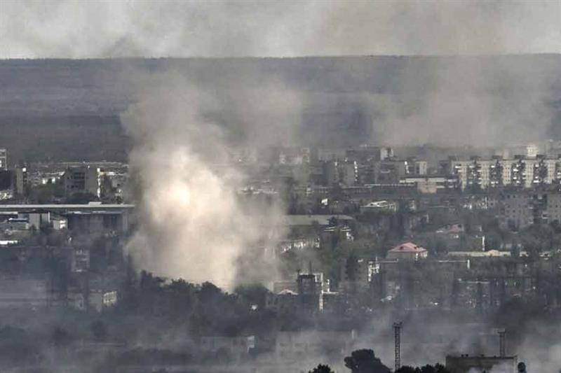 Smoke and dirt rise from shelling in the city of Severodonetsk during fight between Ukrainian and Ru