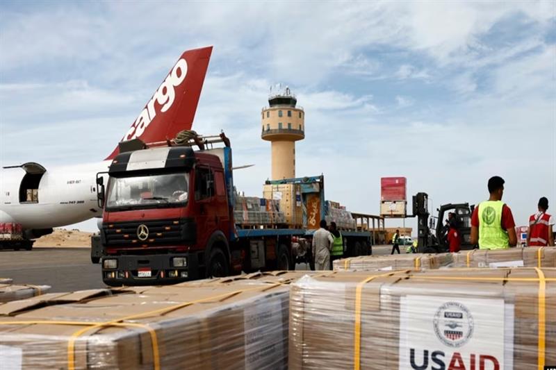 Workers unload humanitarian aid to Gaza 