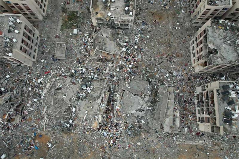 An aerial view shows the destruction caused by Israeli strikes in Wadi Gaza, in the central Gaza Str