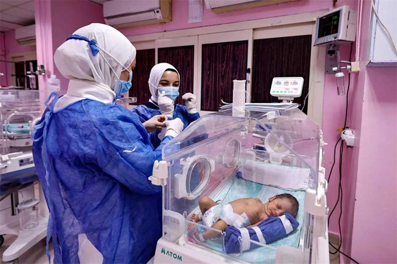 Egyptian medics provide care to premature Palestinian babies, recently evacuated from the Gaza Strip