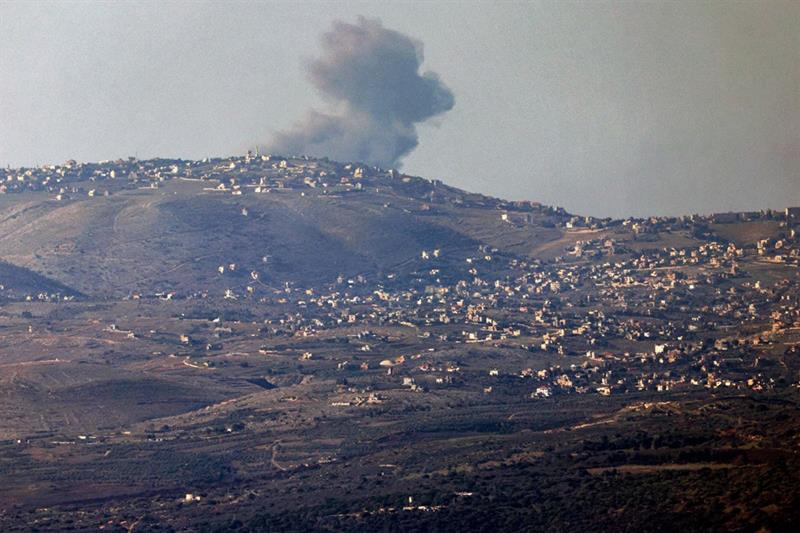 Smoke billows across the horizon along the hills in southern Lebanon from Israeli bombardment from a